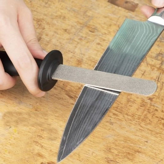 aiguiseur couteau manuel affutage lame planche bois